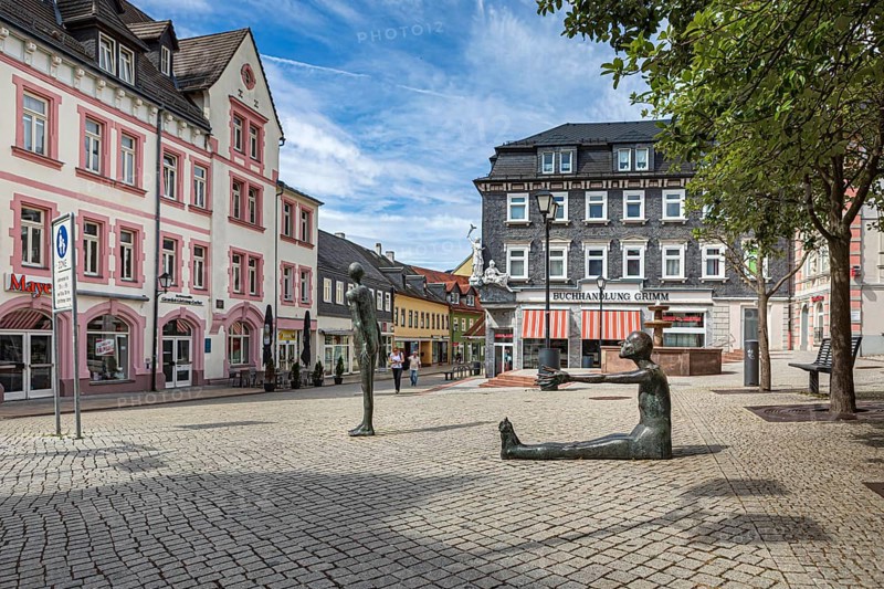 Market street with pharmacy fountain in Ilmenau, Thuringia, Germany