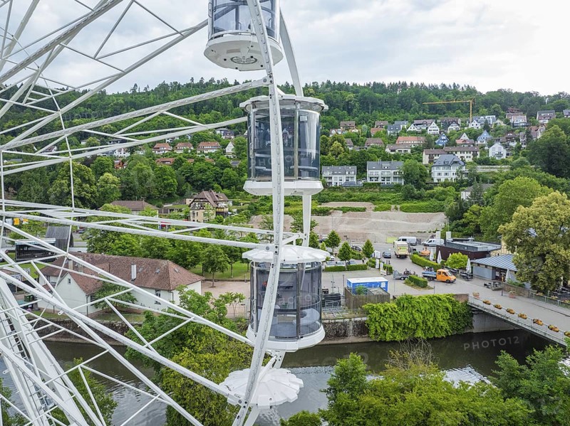 Cityscape and river seen from the Ferris wheel in cloudy weather, Ferris wheel construction for the 950th anniversary of the town of Calw, Black Forest, Germany