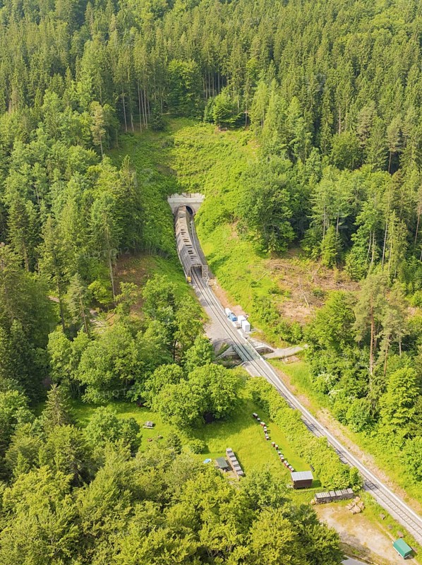 A wooded area with a railway line and a tunnel in the middle, construction of the Hermann Hesse Railway, Calw, Germany