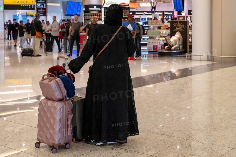 Arab woman with traditional garment and headdress