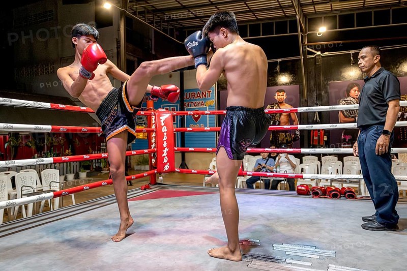 Thai boxing Muai Thai boxer in action, Pattaya, Thailand