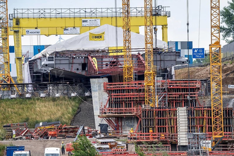 Rhine bridge Duisburg-Neuenkamp, motorway A40, start of construction of the second bridge, bridge piers and the first bridge segment are erected on the Neuenkamp side of the Rhine, North Rhine-Westphalia, Germany