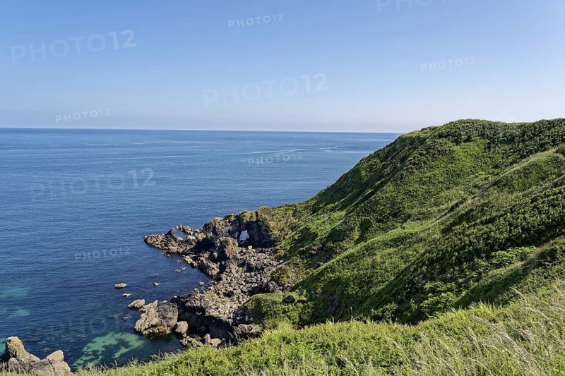 Rocky coast and landscape on the south-east coast near the southern tip of Cornwall on the English Channel. Cadgwith, Cornwall, South West England, Great Britain