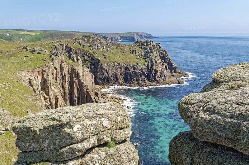 Rock formation off the west coast of England on the Atlantic Ocean. Land's End, the tip of the headland in the west of Cornwall, is the most westerly point in England. Land's End, Sennen, Penzance, Cornwall, South West England, Great Britain