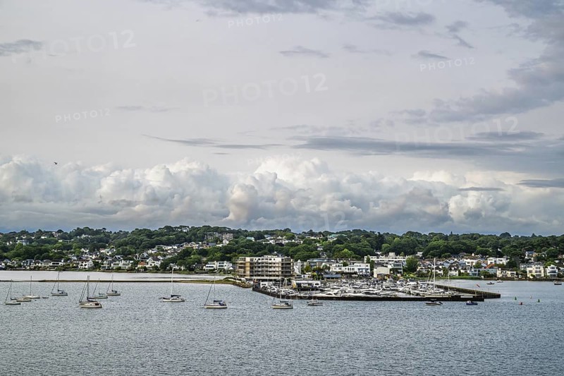 Yachts over Ramshorn Lake and Poole, Brownsea, Dorset, England, United Kingdom