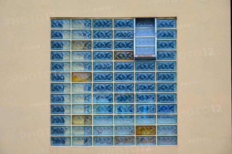 Rectangular window with blue glass blocks in a geometric pattern on a beige wall, Rüdesheim am Rhein, Rhine Valley, Rheingau-Taunus district, Hesse, Germany