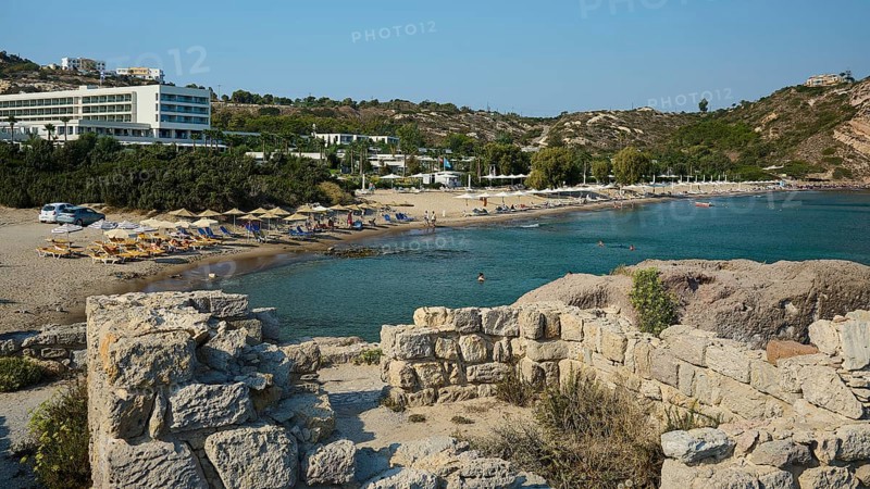 Coastal view with beach and neighbouring ruins, in the background a hotel, Agios Stefanos Beach, Agios Stefanos Basilica, Chapel Agios Nikolaos, Kastri Island, Kos, Dodecanese, Greek Islands, Greece