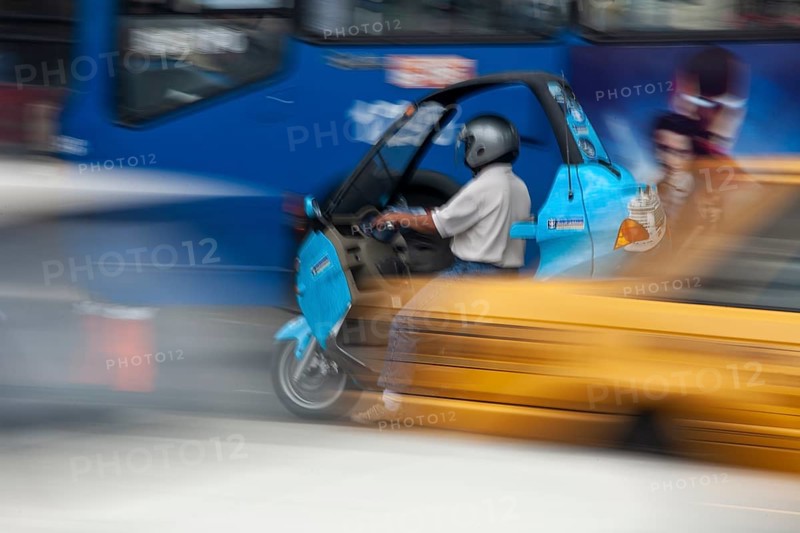 Man riding a motorcycle, Riding at high speed, Photo with motion blur, City of Quito, Pichincha province, Ecuador, South America