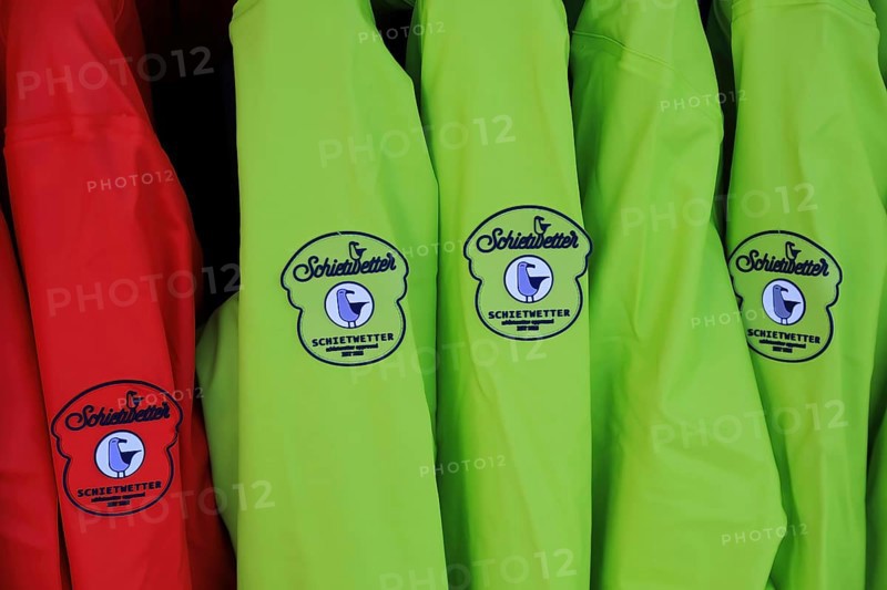 Weather jackets from the manufacturer Schietwetter in an outdoor shop in Husum, Schleswig Holstein, Germany (for editorial use only)