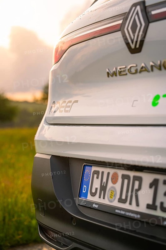 Rear view of a Renault with licence plate and sunlight in the background, Deer E- CarSharing, Renault Megane electric car, Calw, Black Forest, Germany