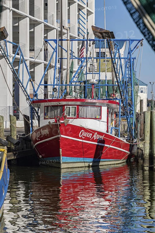 Commercial fishing boat Queen Angel at dock in the commercial section of the Biloxi Small Craft Harbor in Biloxi, MS