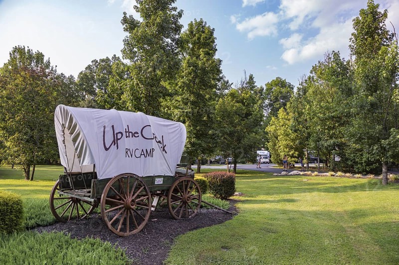 Covered wagon used for sign at the Up the Creek RV Camp campground in Pigeon Forge, Tennessee