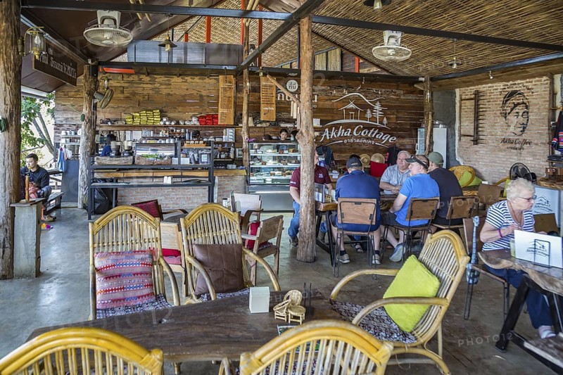 American missionary volunteers eating at the Akha Cottage restaurant and coffee shop in Chiang Rai, Thailand