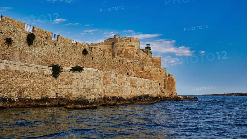 Castello Maniace, sea fortress Maniace, historic fortress on the water, striking under a clear blue sky, boat trip around the island of Ortigia, Isola di Ortigia, Syracuse, Sicily, Italy