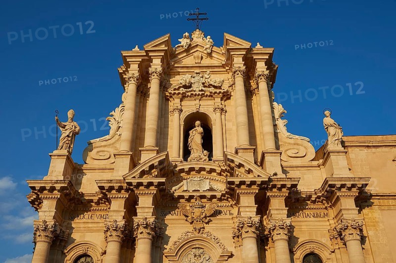 Cathedral of Syracuse, detailed view of the cathedral with sculptures and blue sky in the background, Ortigia Island, Isola di Ortigia, Historic Centre, Syracuse, Sicily, Italy
