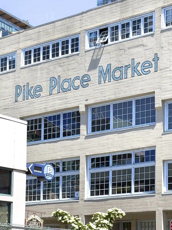 House wall with painted blue letters at Pike Place Market, Seattle, Washington, USA, North America