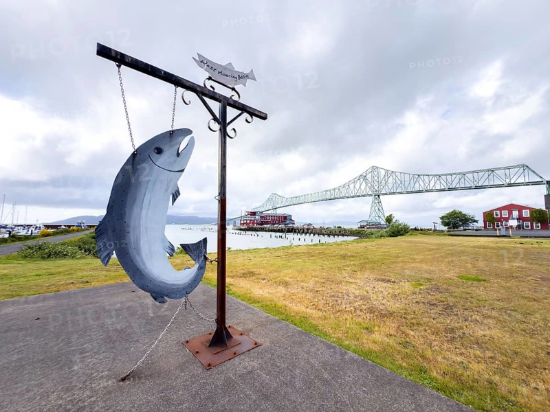 Fish sculpture in front of the Astoria Megler Bridge on the Columbia River, Astoria, Oregon, USA, North America