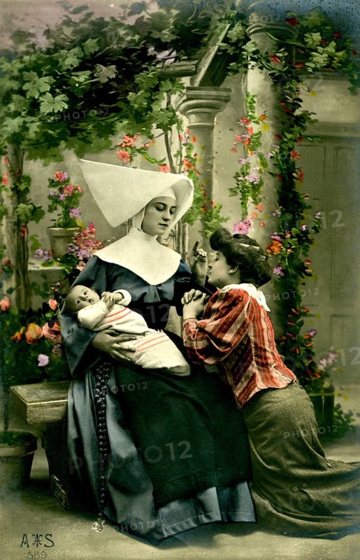 Nun, woman, baby, 1920, A nun holds a child, a woman kneels next to her in a flowering garden, Historical photo