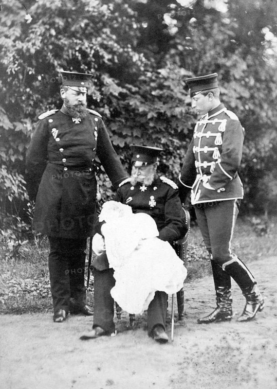 Original photo of the three emperors William I, Frederick III and William II with their son, 1910s, Three men in military uniforms standing with a baby in the countryside, Historical photo