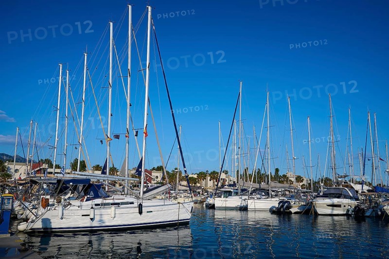 A harbour full of sailing boats and yachts against a clear blue sky, Marina, Kos Town, Kos, Dodecanese, Greek Islands, Greece