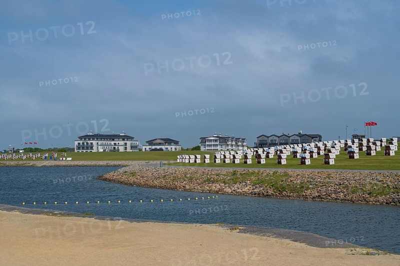 Beach chairs on the family lagoon, Perlebucht, Büsum, North Sea, Schleswig-Holstein, Germany