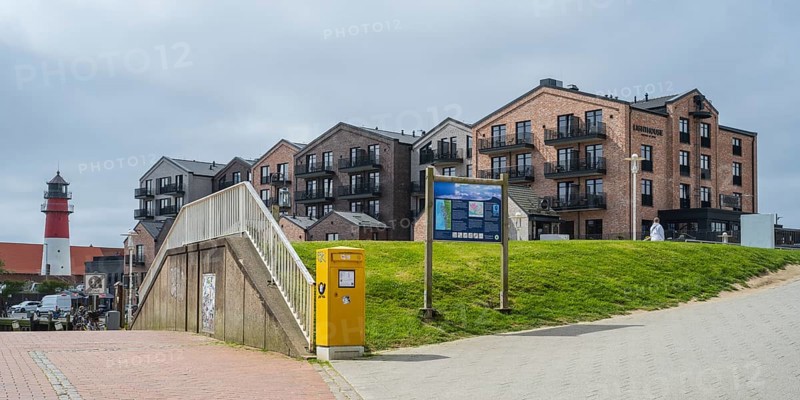 Hotel and apartment building, lighthouse, Am Hafen, Büsum, North Sea, Schleswig-Holstein, Germany