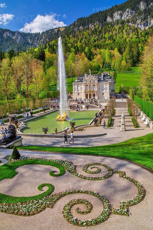 Water parterre with large fountain and portal of Linderhof Castle in spring, municipality of Ettal, Ammergau Alps, Ammertal, Upper Bavaria, Bavaria, Germany
