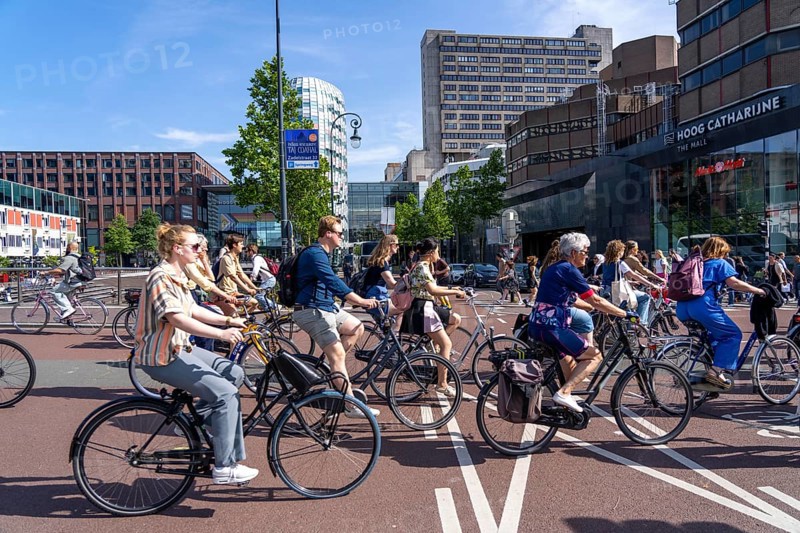 Central cycle path on the Lange Viestraat, lanes for pedestrians, cyclists and local traffic are separated in the city centre, dense traffic, no car/truck traffic, Utrecht, Netherlands