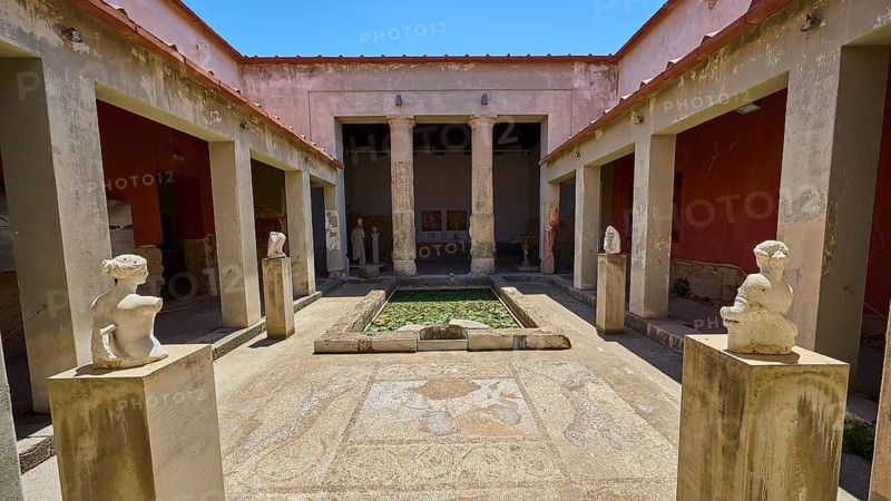 ©Udo Rein, Ancient courtyard with statues and mosaic floor between columns, water basin, Casa Romana, Kos Town, Kos, Dodecanese, Greek Islands, Greece