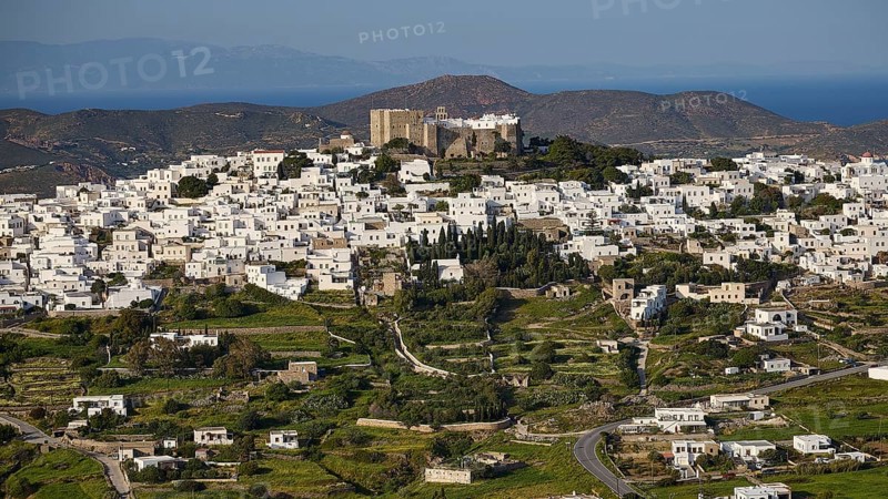 Panoramic view of a town with white houses in a green landscape, Monastery of St John the Theologian, Monastery of St John the Theologian, World Heritage Site 1999, Chora, Patmos, Dodecanese, Greek Islands, Greece