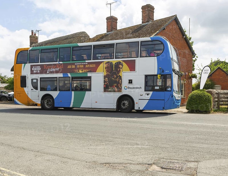 Stagecoach double decker Scania Enviro400 bus at bus stop, village of Avebury, Wiltshire, England, UK