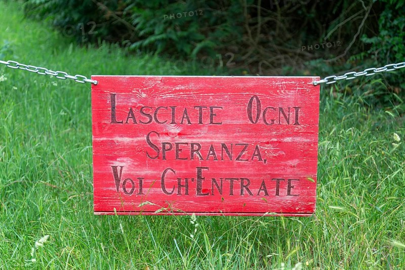 Lasciate Ogni Speranza Voi Ch'Entrate sign on chain, Suffolk, England, UK - abandon all hope, ye who enter