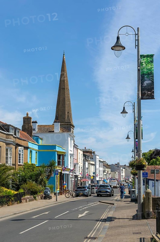 Shops in street of historic buildings, The Strand, Dawlish, south Devon, England, UK