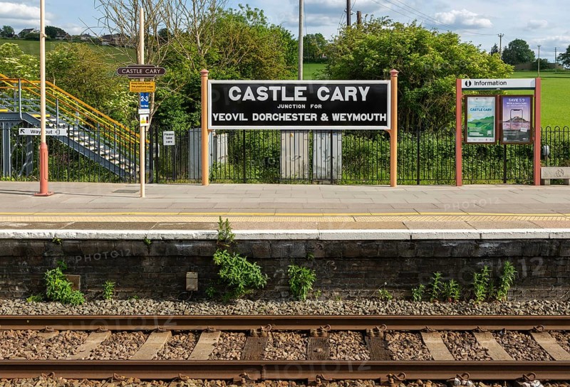 Railway station platform sign Castle Cary junction for Yeovil Dorchester and Weymouth, Somerset, England, UK