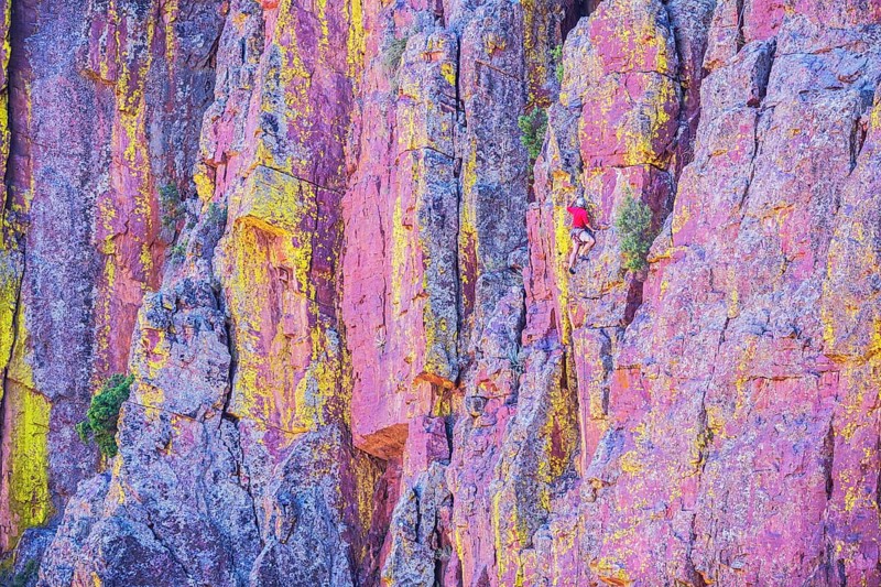 Man climbing canyon wall, Tonto National Forest, Arizona, USA, North America