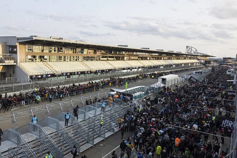Festival visitors stream via separate entrances to the front breakwaters in front of the Utopia Stage at the Rock am Ring Festival on Sunday, Nürburgring race track race track, 08.06.2025