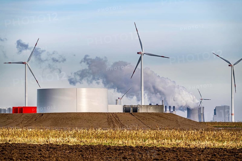 Construction site for the expansion of the wind farm east of Jackerath, in the Rhenish lignite mining district, in the background, the Neurath lignite power plant, North Rhine-Westphalia, Germany