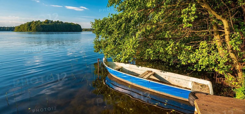 Stiller See with dock and rowing boat, Großer Lychensee, Lychen, Uckermark, Brandenburg, Germany