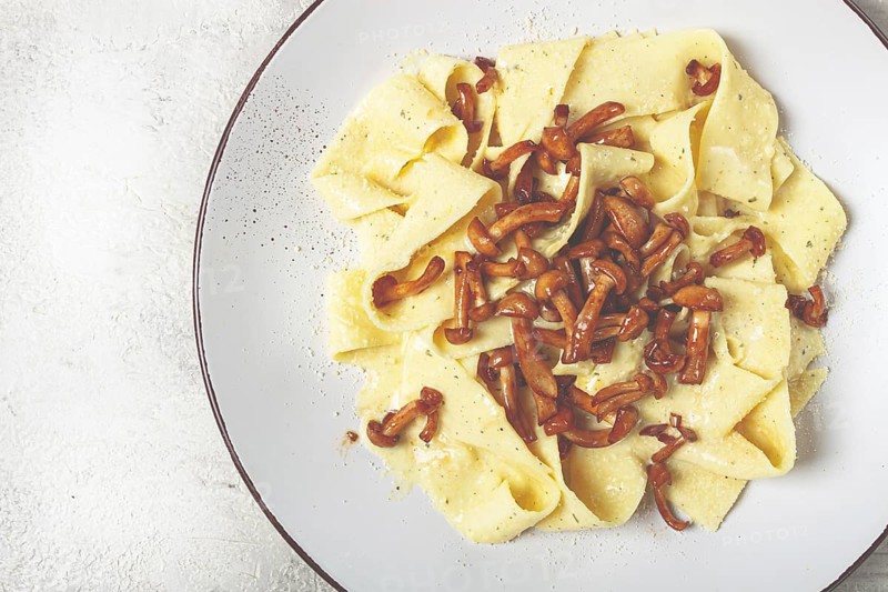 Pasta papardelle, in creamy garlic sauce, with mushrooms, traditional Italian cuisine, pasta carbonara, homemade, no people