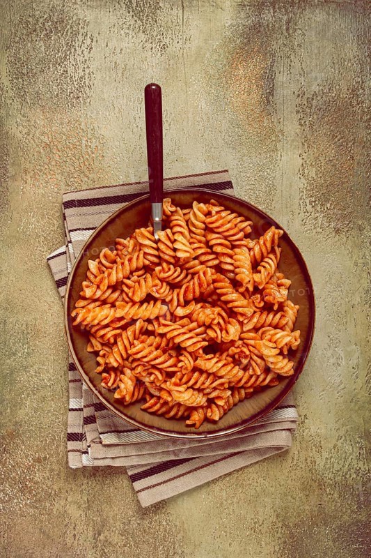 Fusilli pasta dish, made with tomato sauce, homemade, no people