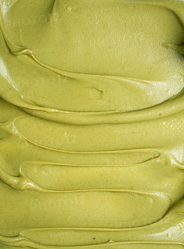 Pistachio paste texture, full frame, close-up