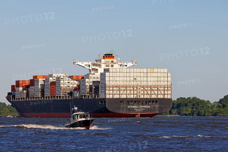 Container ship Istanbul Express sails up the Elbe towards the Port of Hamburg, shipping on the Elbe, Wedel, Schleswig-Holstein, Germany