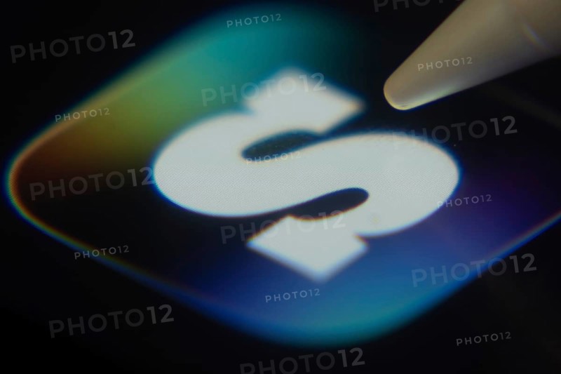 Dhaka, Bangladesh- 06 Dec 2025: Close-up of the SCRUFF app on a screen with a stylus pointing at it