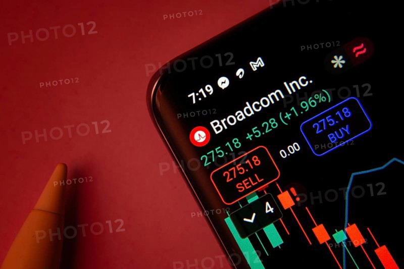 Dhaka, Bangladesh- 08 Sep 2025: Close-up of a phone screen showing Broadcom Inc stock market data with a candlestick chart