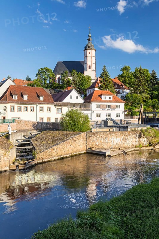 City view with Unser lieben Frauen auf dem Berge church and fish stairway at the Zwickauer Mulde barrage, Penig, Saxony, Germany