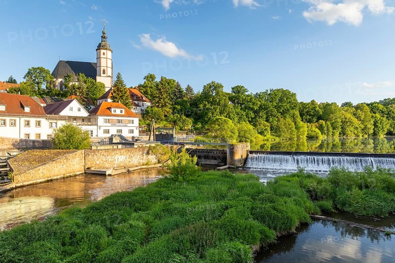 City view with church of Our Lady on the mountains and barrage of the Zwickauer Mulde, Penig, Saxony, Germany