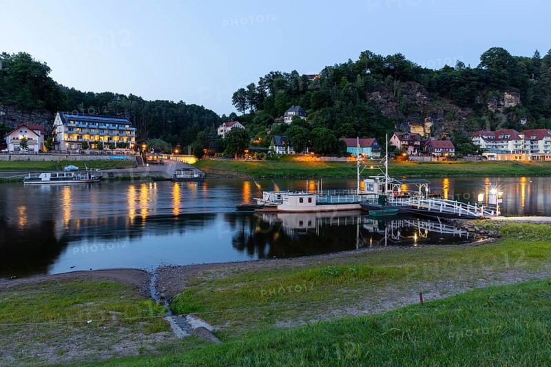 Twilight view of the ferry across the Elbe in the spa town of Rathen, Saxon Switzerland, Saxony, Germany
