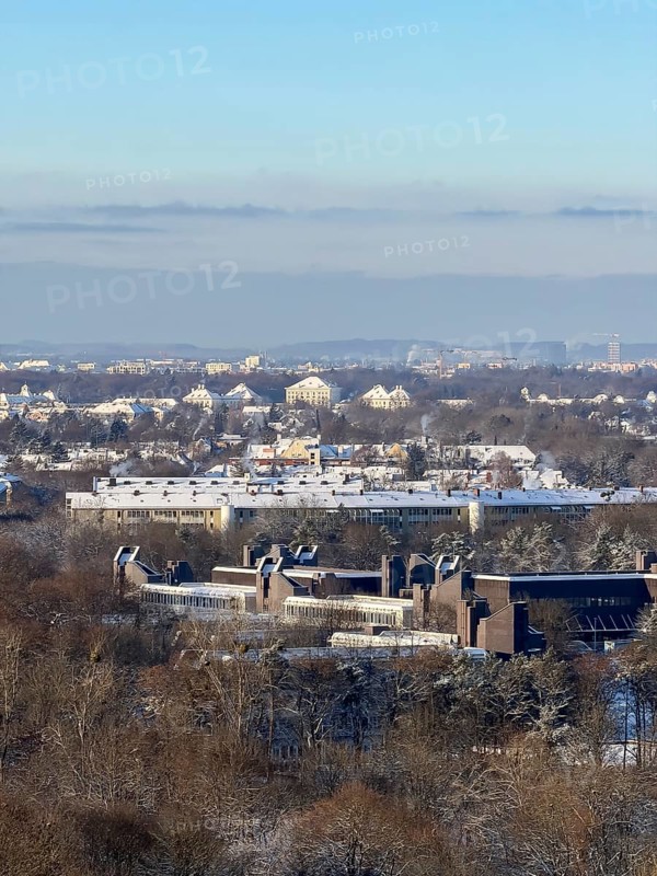 View of Munich from Olympic Mountain to Nymphenburg Castle with snow, Olympic Park, Munich, Bavaria, Germany