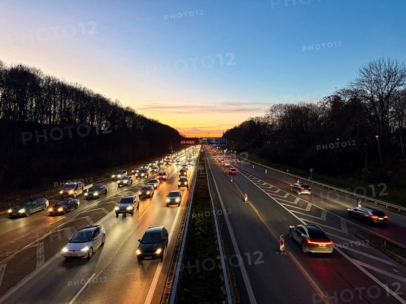 Cars driving on the motorway at sunset in the evening, Autobahn A96 Lindau, Munich, Bavaria, Germany