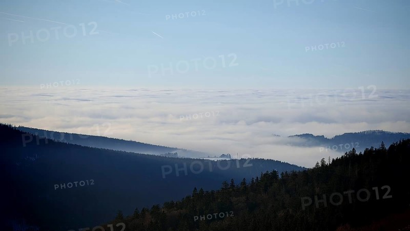 Mountains and hills covered in fog under a clear sky, Fichtelgebirge